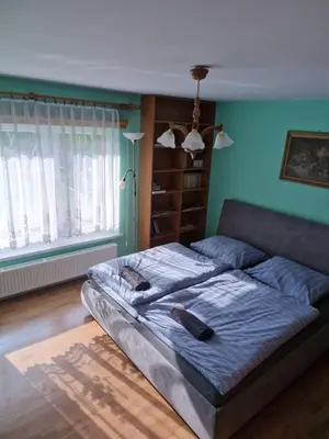 Łóżko lub łóżka w pokoju w obiekcie Apartament Wakacyjny JM