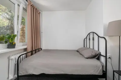 Łóżko lub łóżka w pokoju w obiekcie Patro Apartament 1 Wrocław Centrum
