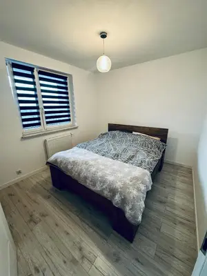 Łóżko lub łóżka w pokoju w obiekcie Przytulny apartament z widokiem