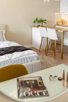 Łóżko lub łóżka w pokoju w obiekcie Apartament z tarasem Otyńska 4 - ProperUNIT