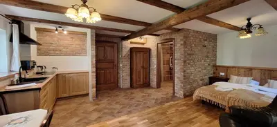 Łóżko lub łóżka w pokoju w obiekcie Jesionówka Apartamenty