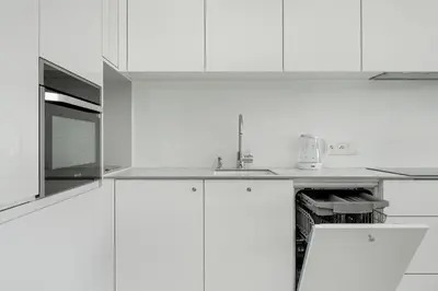 Kuchnia lub aneks kuchenny w obiekcie Miedziana Bright Apartment with Balcony and Parking Wroclaw by Noclegi Renters