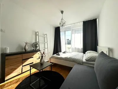 Łóżko lub łóżka w pokoju w obiekcie Wita Stwosza Apartment - Self Check-In 20h