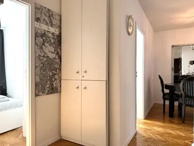 Łóżko lub łóżka w pokoju w obiekcie Wita Stwosza Apartment - Self Check-In 20h