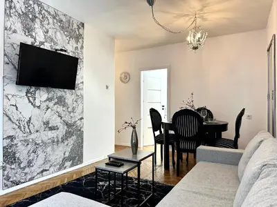 Telewizja i/lub zestaw kina domowego w obiekcie Wita Stwosza Apartment - Self Check-In 20h