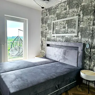 Łóżko lub łóżka w pokoju w obiekcie APARTAMENT Z WIDOKIEM Wałbrzych