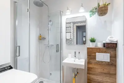 Łazienka w obiekcie RentPlanet - Apartament Nowowiejska