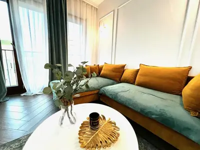 Część wypoczynkowa w obiekcie 2-pokojowy apartament z jacuzzi w centrum Top widok!