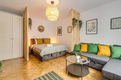 Łóżko lub łóżka w pokoju w obiekcie RentPlanet - Apartament Kościuszki
