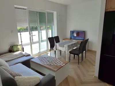 Telewizja i/lub zestaw kina domowego w obiekcie Apartament przy przystani