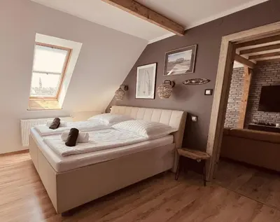 Łóżko lub łóżka w pokoju w obiekcie Apartament dwupoziomowy BALI