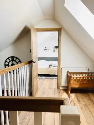 Łóżko lub łóżka w pokoju w obiekcie Apartament dwupoziomowy BALI