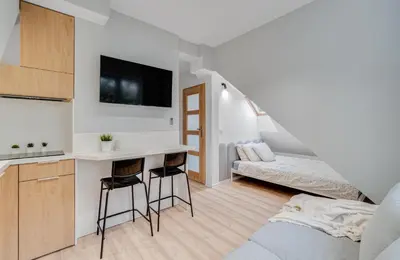 Łóżko lub łóżka w pokoju w obiekcie COMFISTAY Dubois 31 - City Access and Free Parking