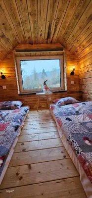 Łóżko lub łóżka w pokoju w obiekcie 3 Peaks Houses - Domki Całoroczne
