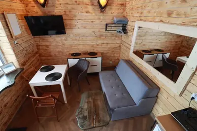 Telewizja i/lub zestaw kina domowego w obiekcie 3 Peaks Houses - Domki Całoroczne
