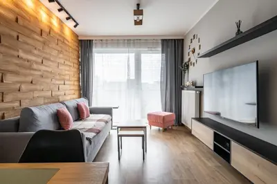 Telewizja i/lub zestaw kina domowego w obiekcie RentPlanet - Apartament Małopanewska