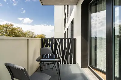 Balkon lub taras w obiekcie RentPlanet - Apartament Małopanewska
