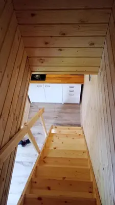 Łóżko lub łóżka w pokoju w obiekcie Domki na Szlaku