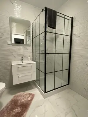 Łazienka w obiekcie Apartamenty JAGODNO