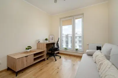 Część wypoczynkowa w obiekcie Exceptional Apartment with Parking for 6 Guests by Noclegi Renters