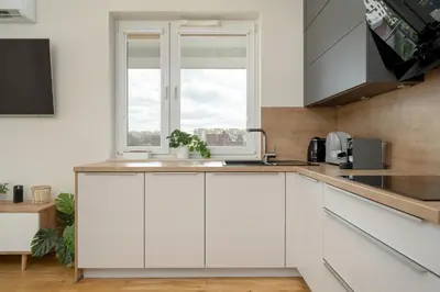 Kuchnia lub aneks kuchenny w obiekcie Exceptional Apartment with Parking for 6 Guests by Noclegi Renters