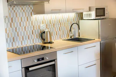 Kuchnia lub aneks kuchenny w obiekcie APARTAMENTY 