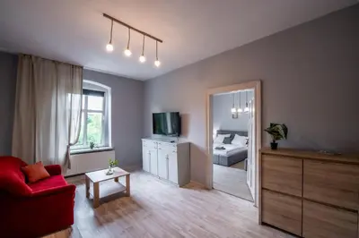 Telewizja i/lub zestaw kina domowego w obiekcie Pokoje nad Kłodnicą