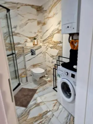 Łazienka w obiekcie Top Apartament II