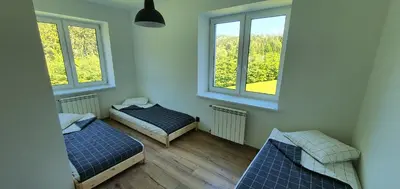 Łóżko lub łóżka w pokoju w obiekcie Bastion Duszniki-Zdrój