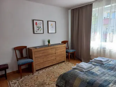 Łóżko lub łóżka w pokoju w obiekcie mieszkanie Tarnowskie Gory obok biblioteki Boleslawa Lubosza