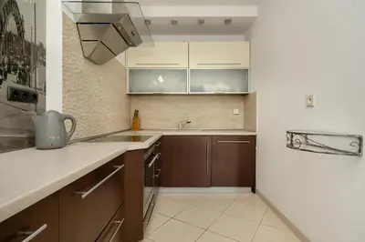Kuchnia lub aneks kuchenny w obiekcie Jasny Dwupoziomowy Apartament we Wrocławiu by Noclegi Renters
