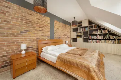 Łóżko lub łóżka w pokoju w obiekcie Jasny Dwupoziomowy Apartament we Wrocławiu by Noclegi Renters