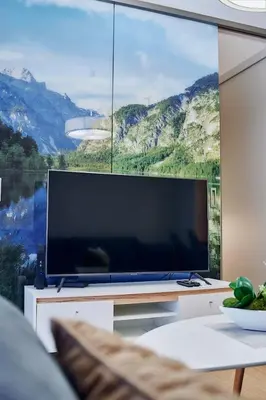 Telewizja i/lub zestaw kina domowego w obiekcie LAGUNA Apartament Polanica Residence 23 Przytulny z klimatyzacją