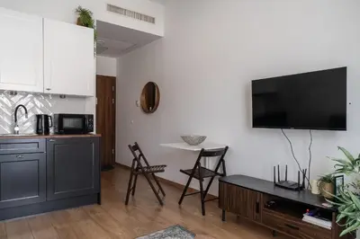 Kuchnia lub aneks kuchenny w obiekcie RentPlanet - Studio na Grobli