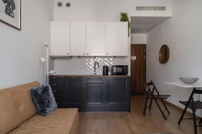 Kuchnia lub aneks kuchenny w obiekcie RentPlanet - Studio na Grobli