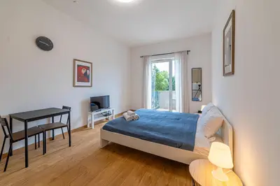 Łóżko lub łóżka w pokoju w obiekcie RentPlanet - Studio na Grobli
