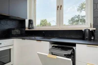 Kuchnia lub aneks kuchenny w obiekcie Przestronne Studio Blisko Starego Miasta by Noclegi Renters