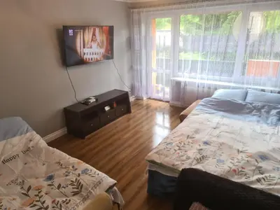 Łóżko lub łóżka w pokoju w obiekcie Apartament Mieszkanie do wynajęcia Olivka