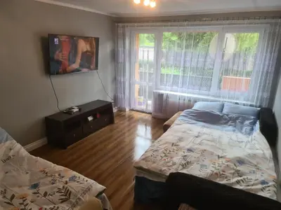 Łóżko lub łóżka w pokoju w obiekcie Apartament Mieszkanie do wynajęcia Olivka