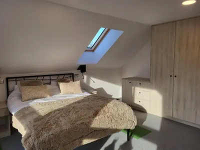 Łóżko lub łóżka w pokoju w obiekcie Domek nad Cichą Doliną