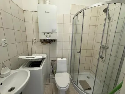 Łazienka w obiekcie Tanie Noclegi Puszkina 6