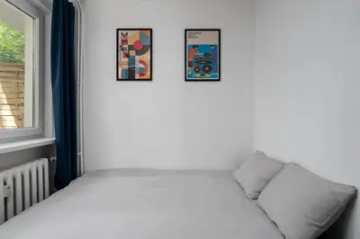 Łóżko lub łóżka w pokoju w obiekcie Patro Apartament 2 Wrocław Centrum