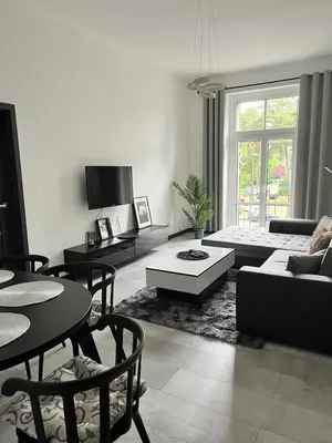Telewizja i/lub zestaw kina domowego w obiekcie Strzelce Queen