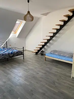 Łóżko lub łóżka w pokoju w obiekcie Agroturystyka Borów - pokoje