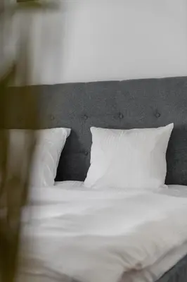 Łóżko lub łóżka w pokoju w obiekcie RentPlanet - Apartament Reja