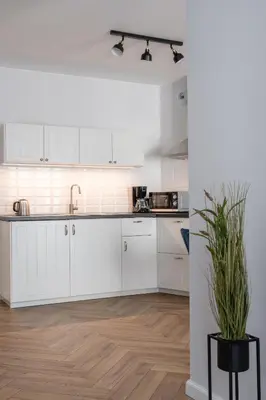 Kuchnia lub aneks kuchenny w obiekcie RentPlanet - Apartament Reja