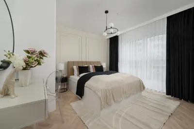 Łóżko lub łóżka w pokoju w obiekcie Ekskluzywne Apartamenty Browary Wrocławskie z Klimatyzacją by Renters Prestige