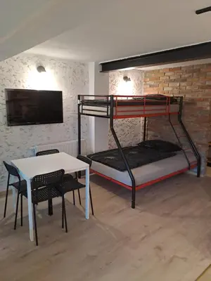 Łóżko lub łóżka w pokoju w obiekcie Loft House Noclegi Nysa