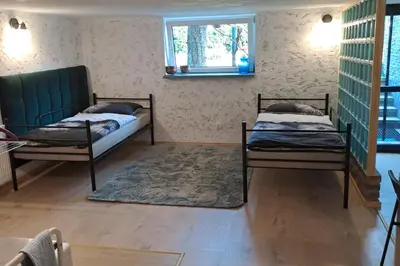 Łóżko lub łóżka w pokoju w obiekcie Loft House Noclegi Nysa