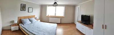 Łóżko lub łóżka w pokoju w obiekcie Pod Orzechem Włoskim